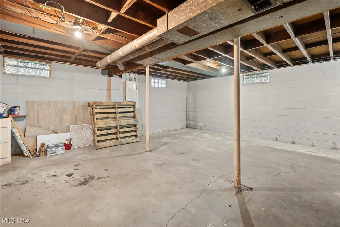 Below grade area with electric panel