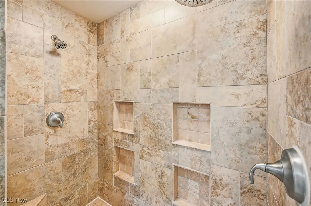 Bathroom view of tiled shower