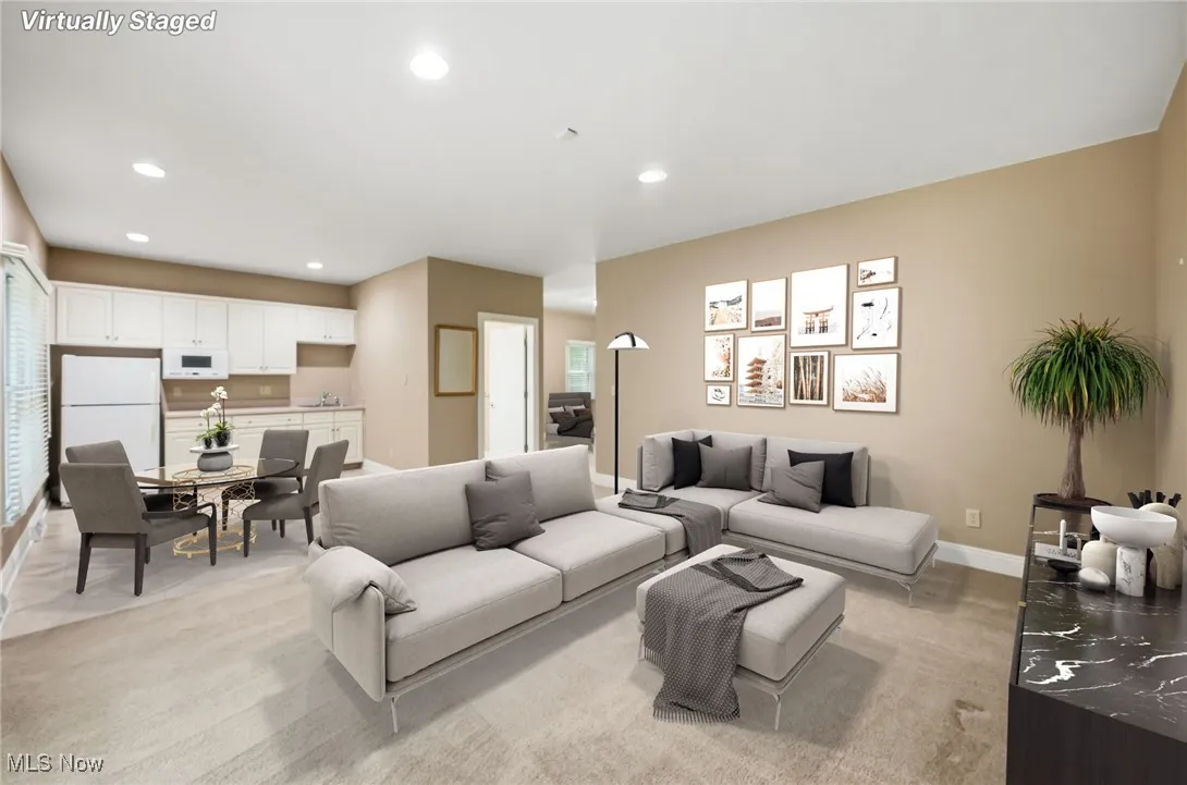  Mother in law suite with recessed lighting and light carpet