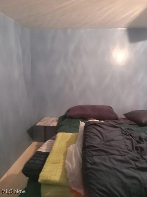 Bedroom featuring a sauna / steam room