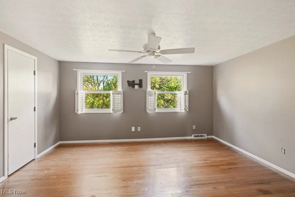 Primary bedroom with dual closets