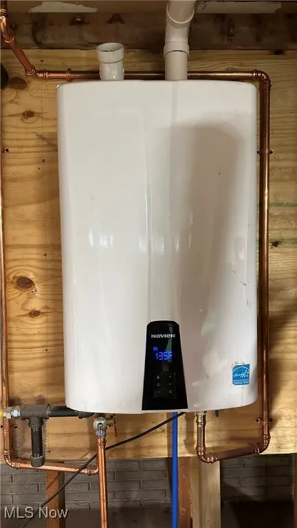 Utilities featuring tankless water heater