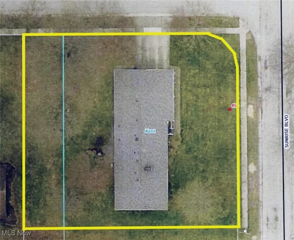 Aerial view of property's location featuring property parcel outlined