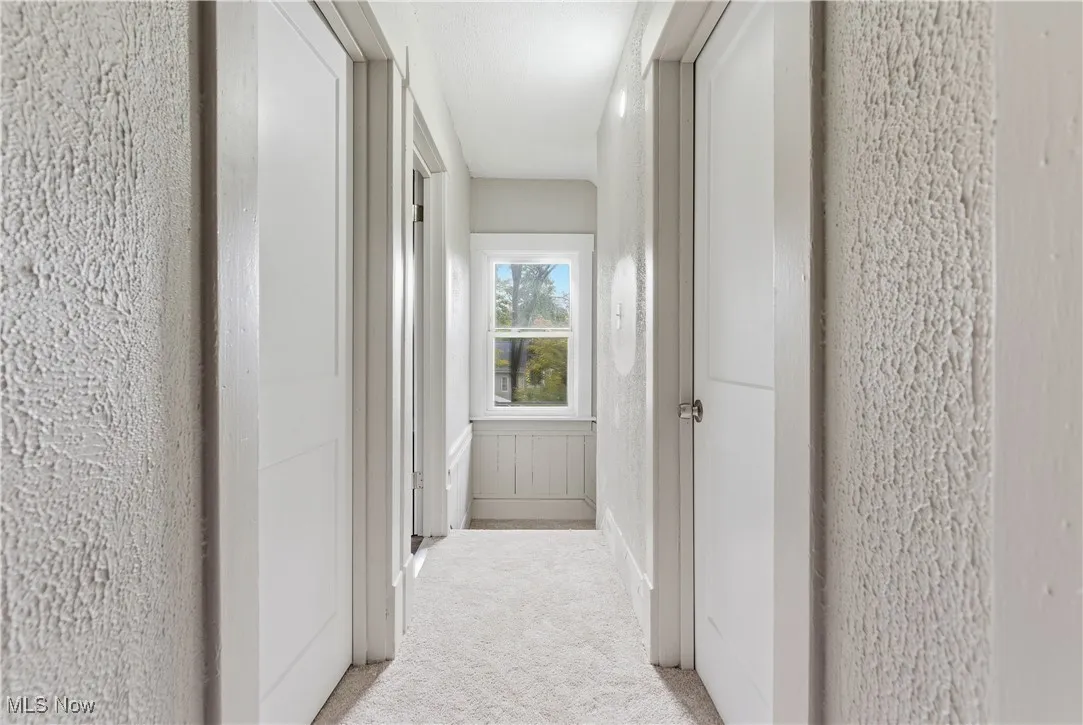 Hall with light carpet