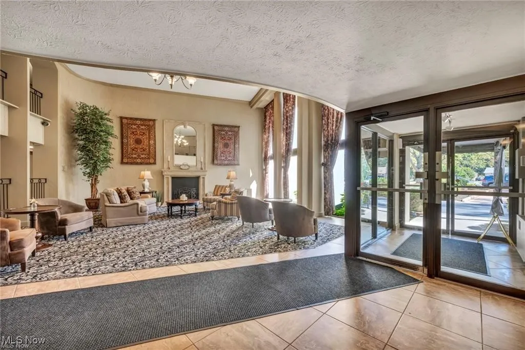 Lobby featuring a textured ceiling