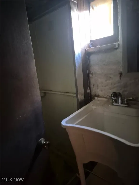 Bathroom featuring a sink