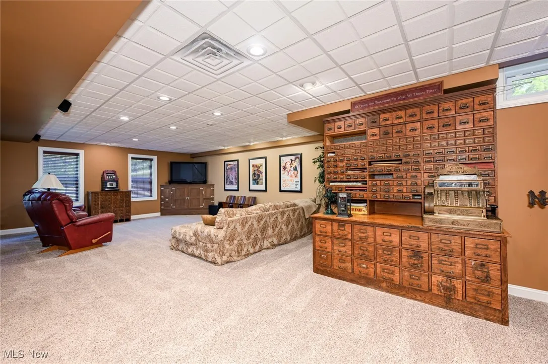 Living room with carpet and recessed lighting