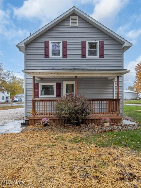View of front of house with covered porch