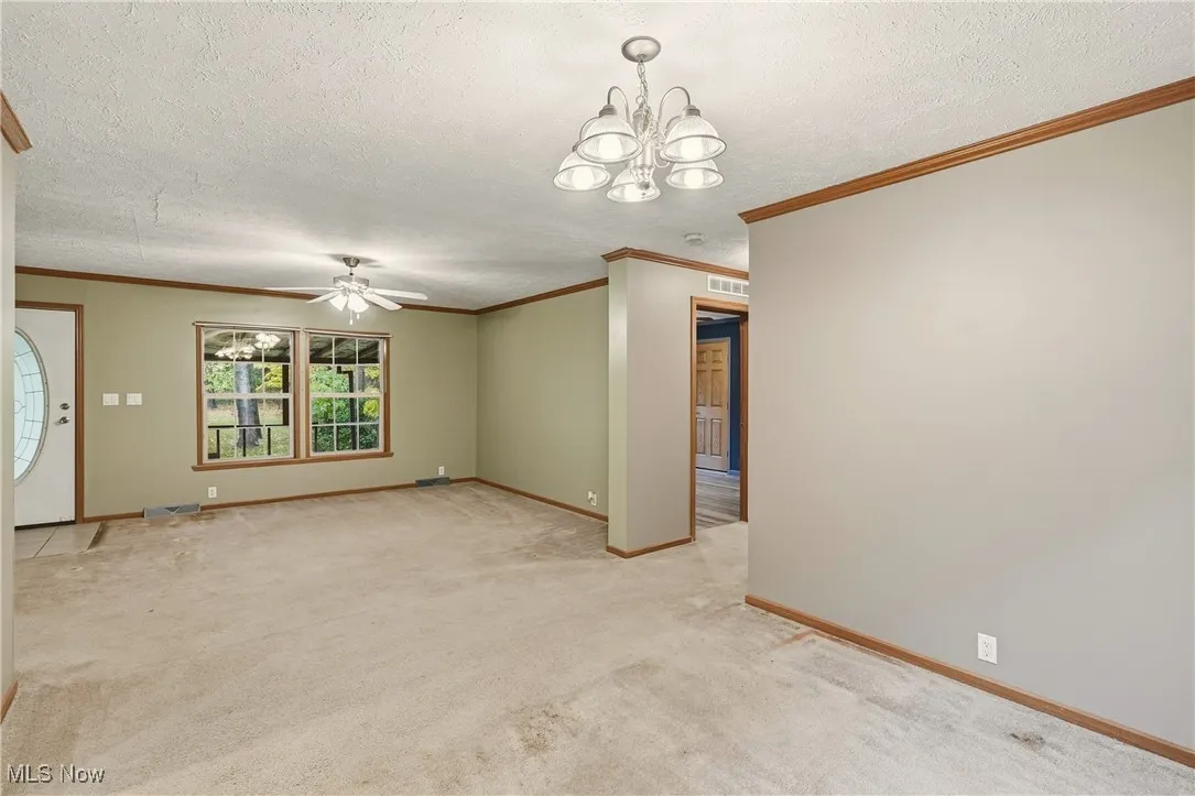 Dining room facing living room and 2 bedrooms
