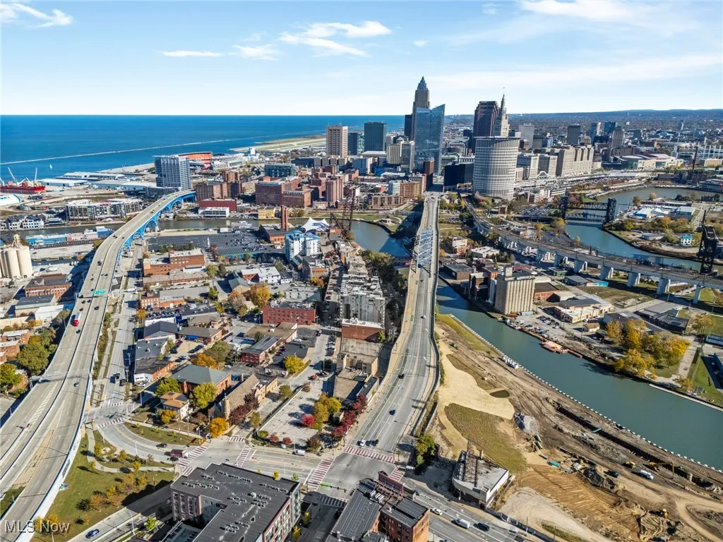 View of property location featuring nearby urban area and a nearby body of water
