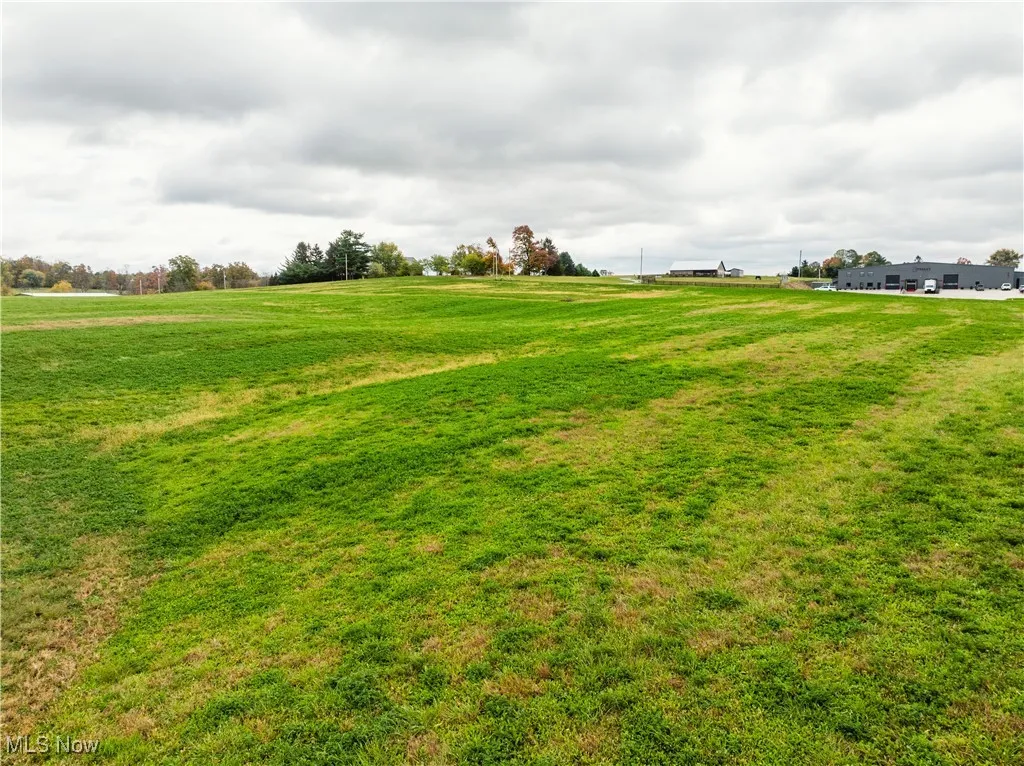 View of grassy yard with a view of countryside