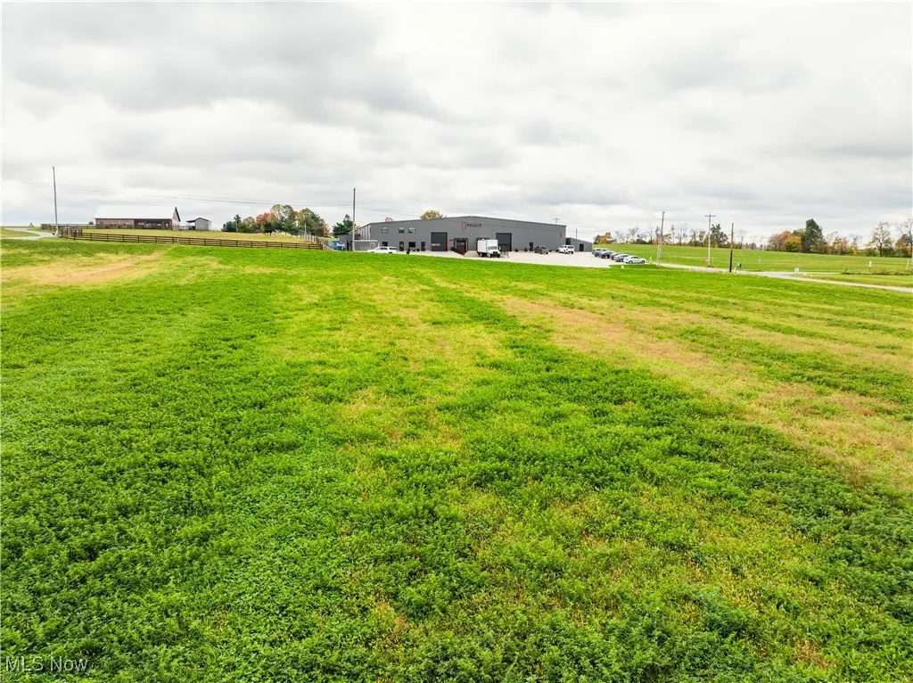 View of green lawn with a view of countryside