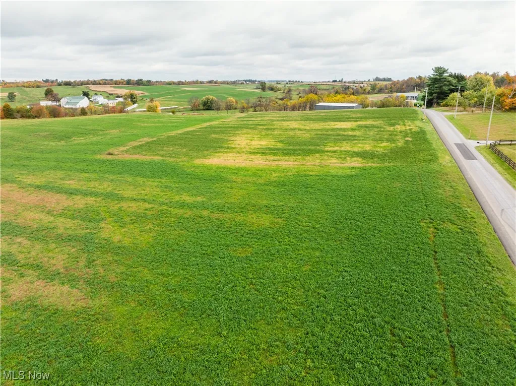 View of grassy yard featuring a view of rural / pastoral area