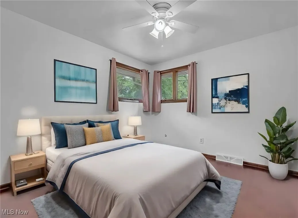 Guest bedroom 4 on first floor with adjacent half bath
virtually staged