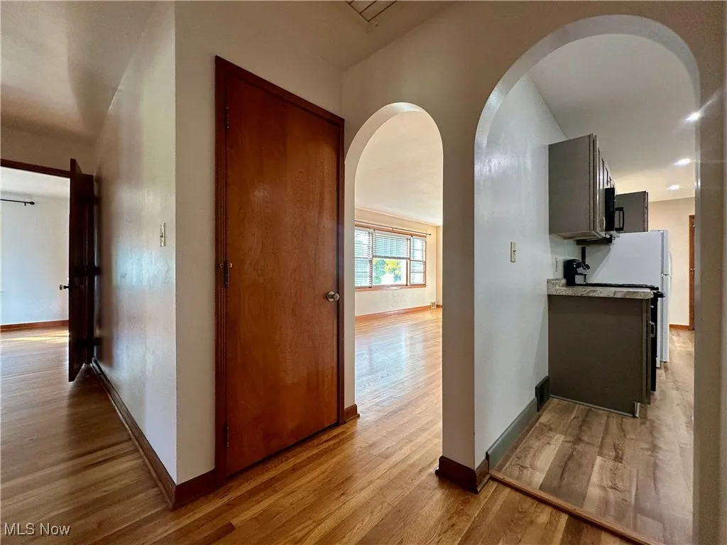 Hallway with arched doorways