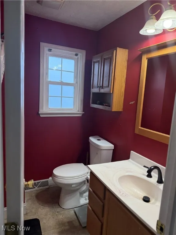 Bathroom with vanity, tub and shower