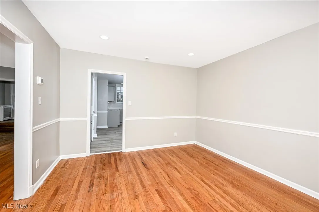 Unfurnished room with light wood-style flooring and recessed lighting