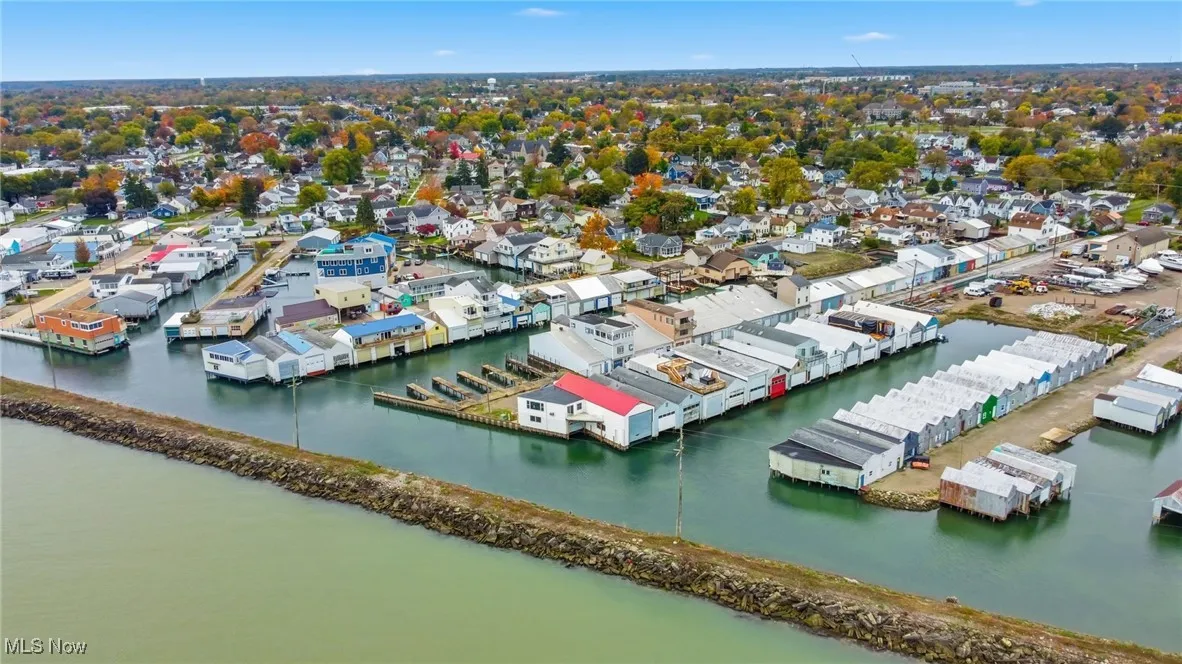 Aerial view of residential area with a nearby body of water