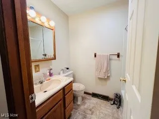 Full bath featuring vanity and a shower with shower curtain