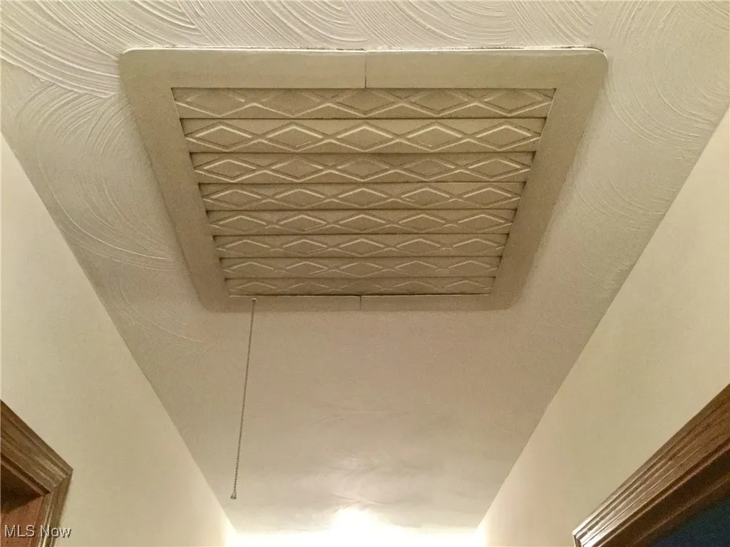 original whole house fan in hall