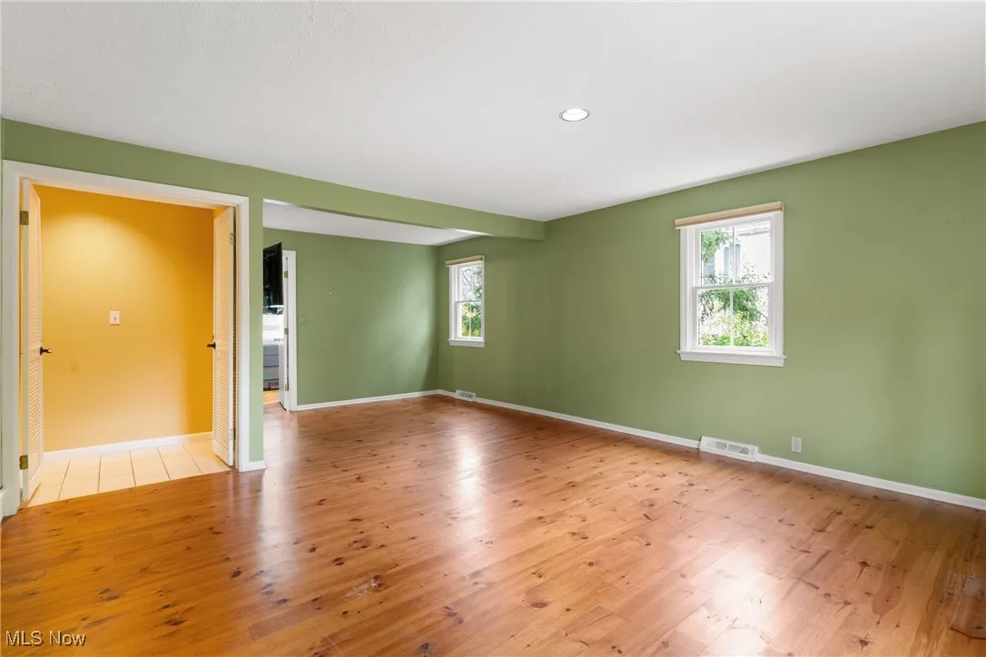 Unfurnished room featuring light wood-style floors and recessed lighting