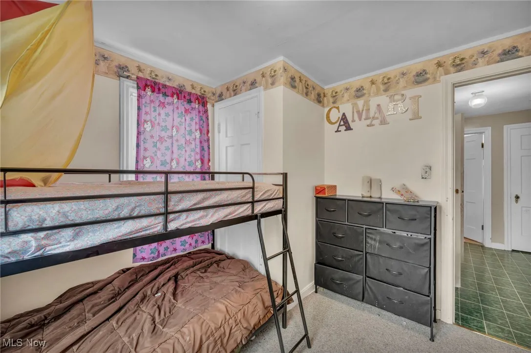 Bedroom with baseboards