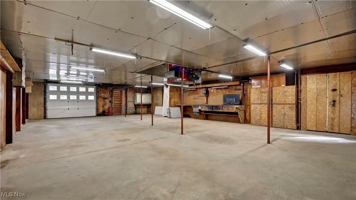 Garage featuring oil tank