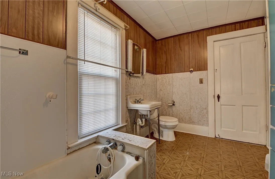 Bathroom with a bath and toilet