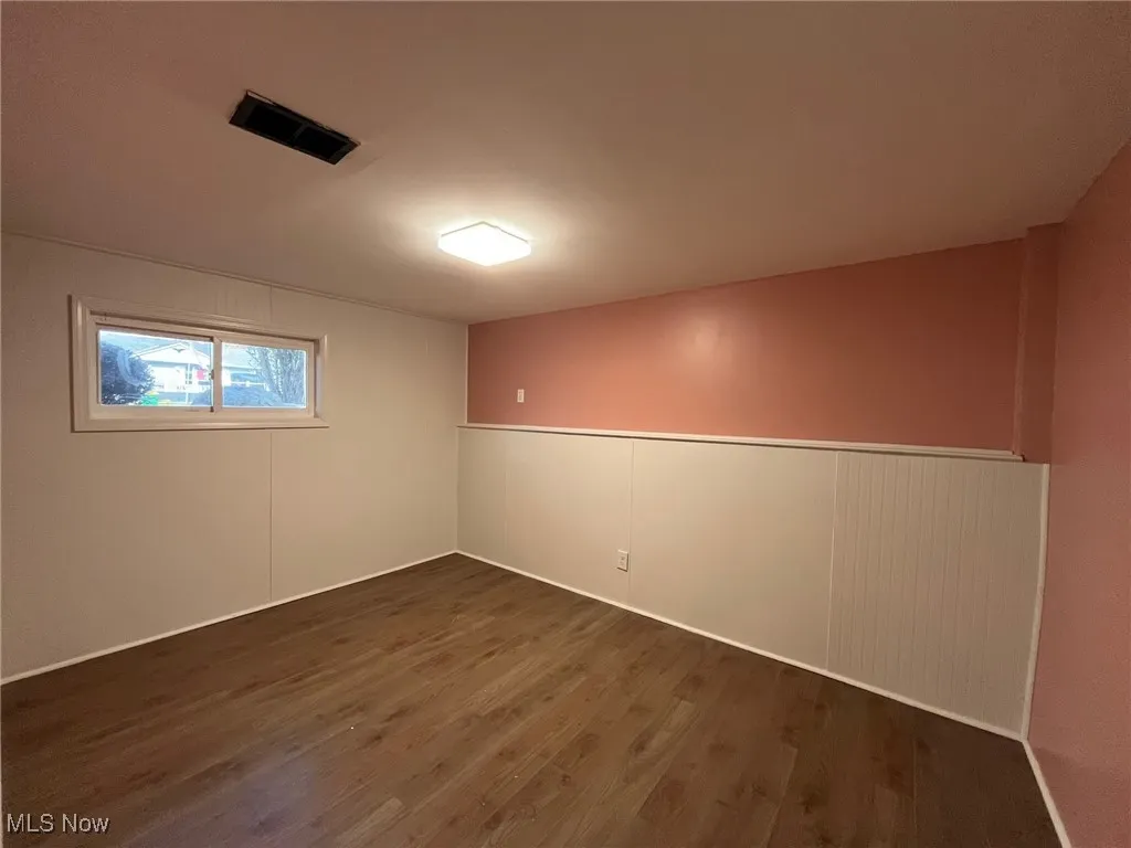 Unfurnished room in lower level