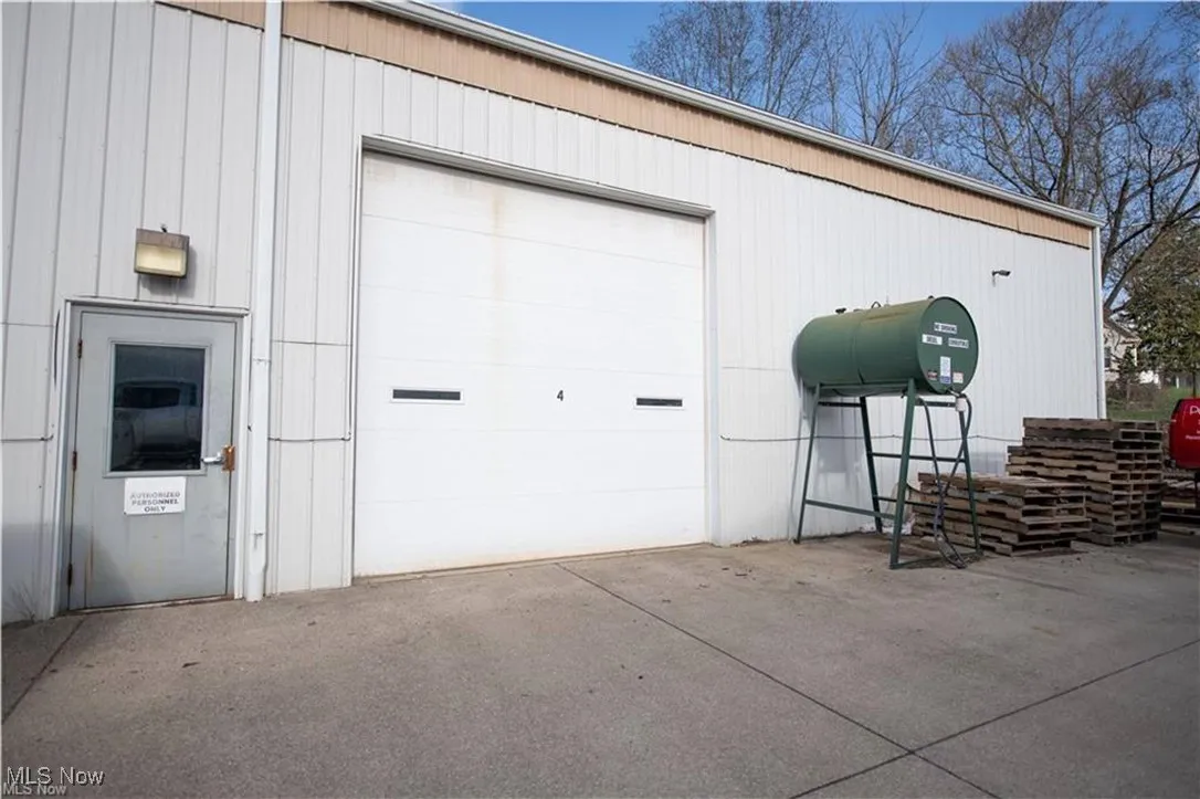 Garage with concrete driveway