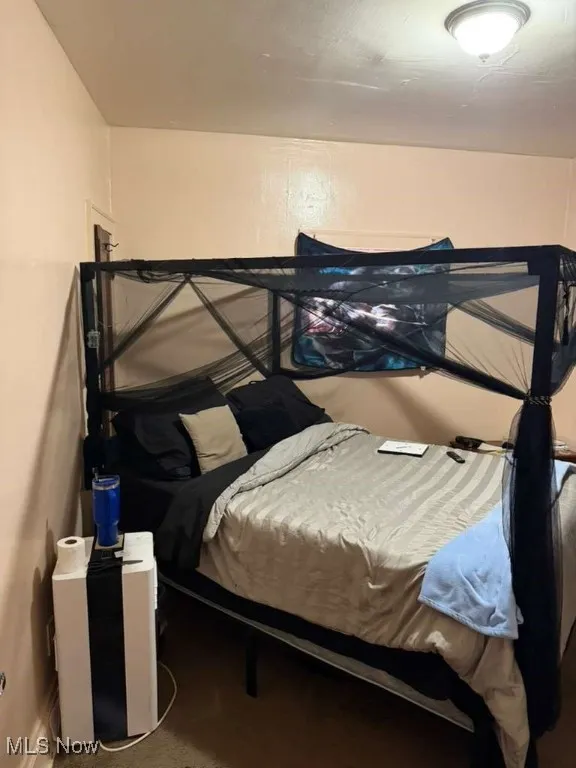 Bedroom featuring baseboards
