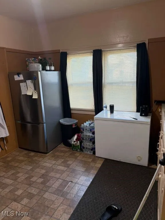 1st floor kitchen with brick patterned flooring