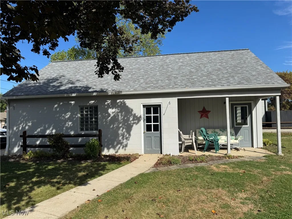 View of side of the detached garage.
