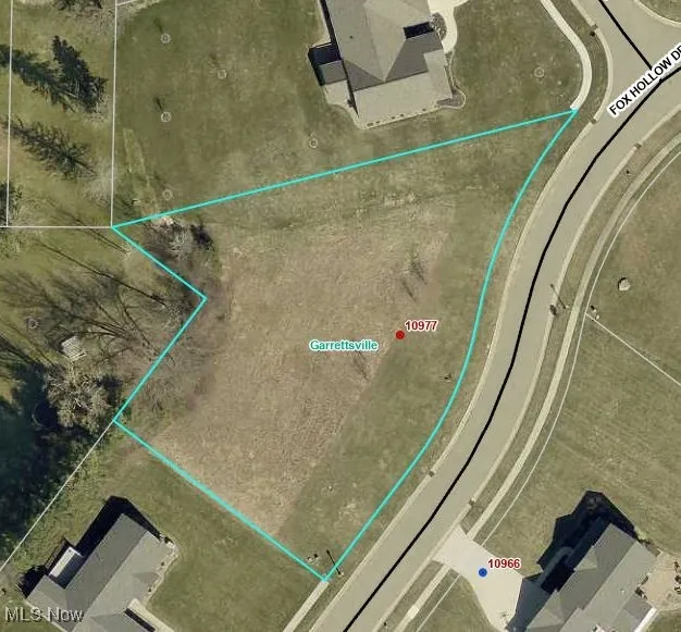 Aerial view of property's location with property parcel outlined