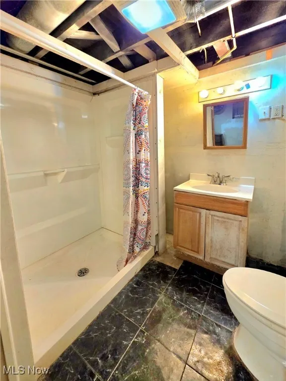 Full bathroom with shower in basement