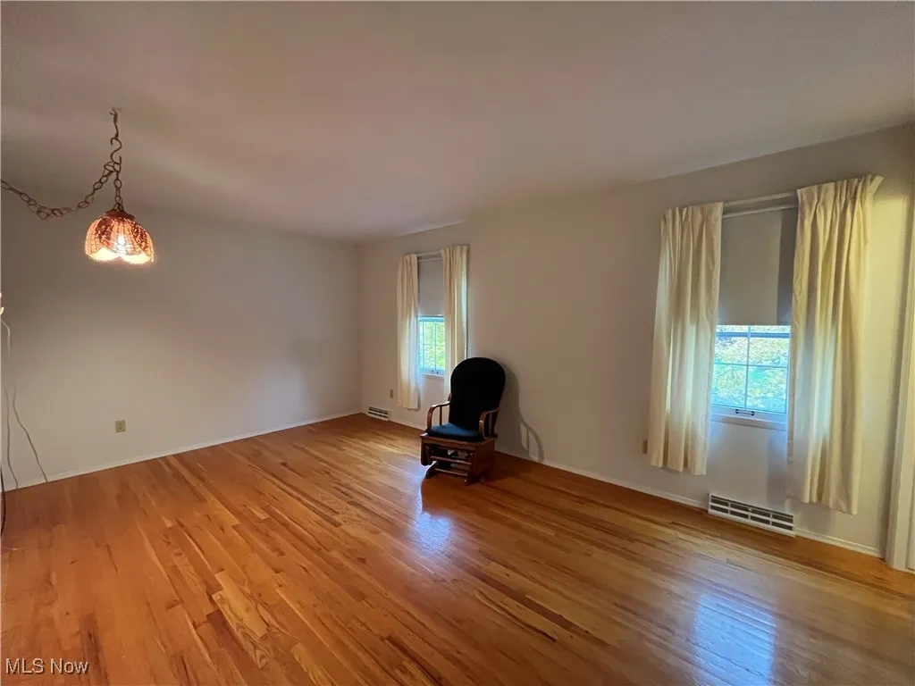 Spacious Master  bedroom with double closets, beautiful hardwood floors, and Full bath with step in shower.