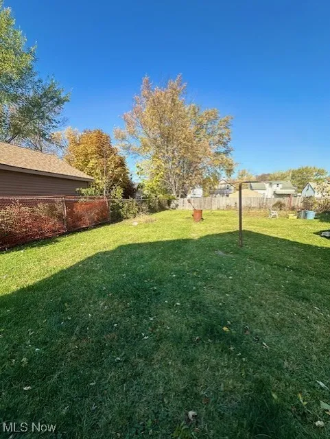 View of fenced backyard