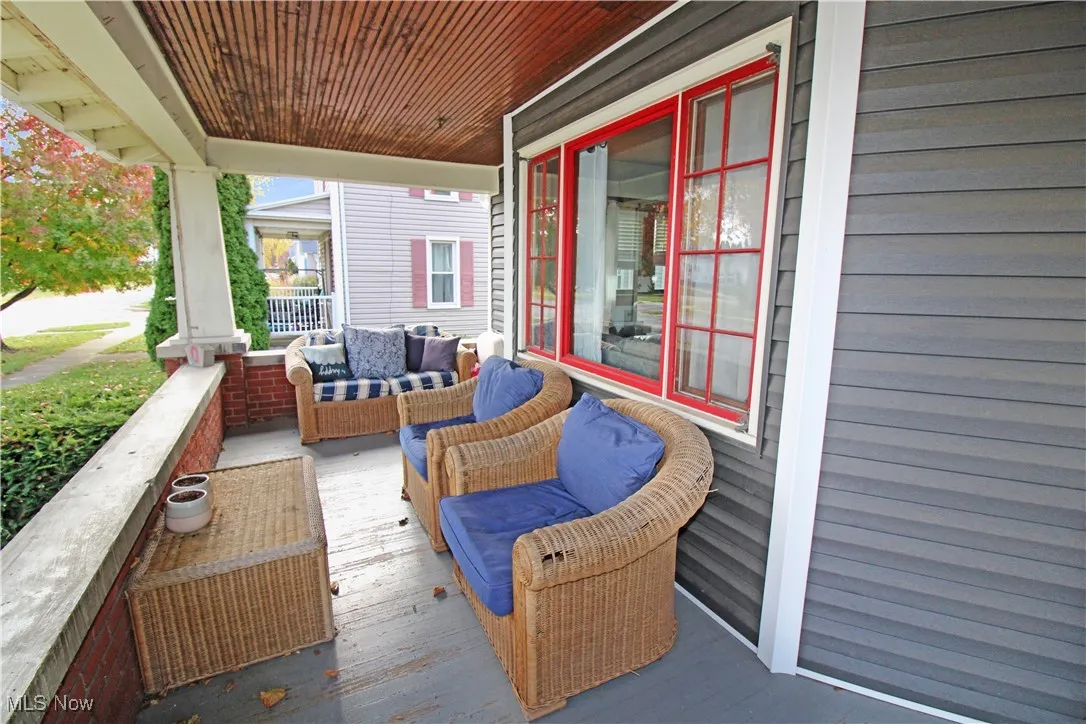 Porch featuring an outdoor hangout area