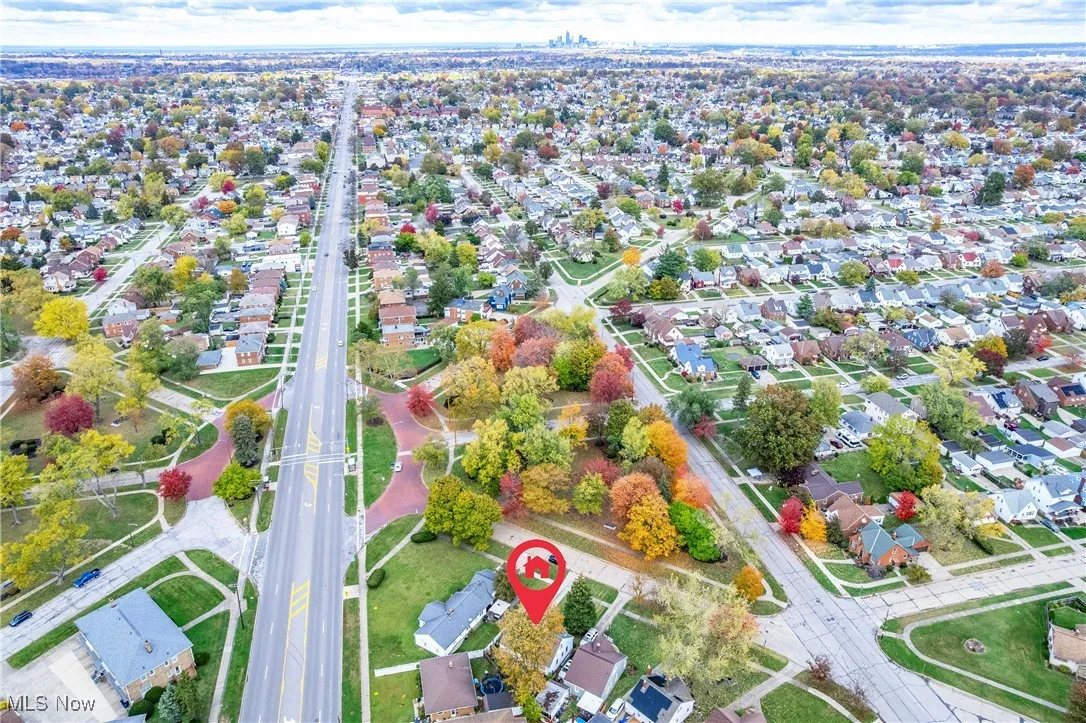 View of property location with nearby suburban area