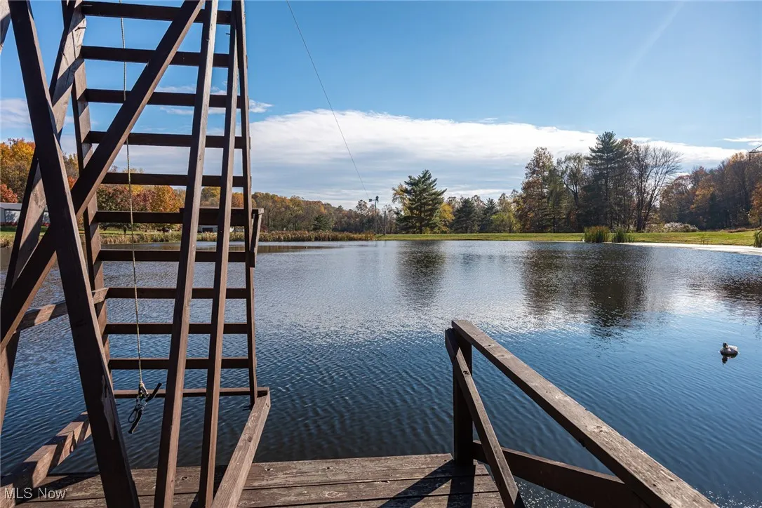 Dock featuring a water view