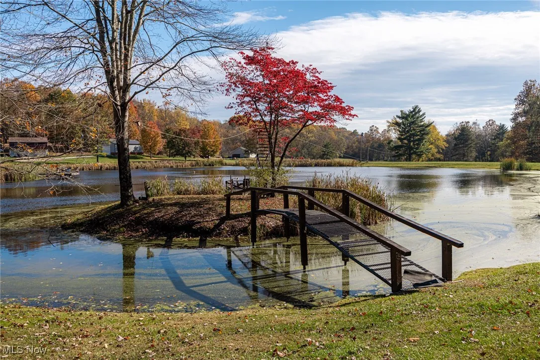 Dock featuring a water view