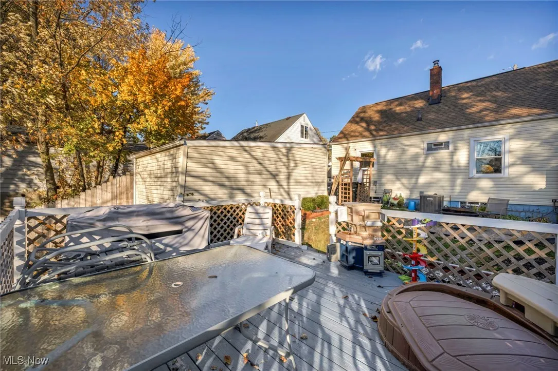 Wooden deck with outdoor dining area