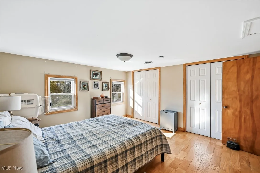 2nd floor primary bedroom boasting dual closets and access to bonus tandem room that leads to 2nd floor bathroom