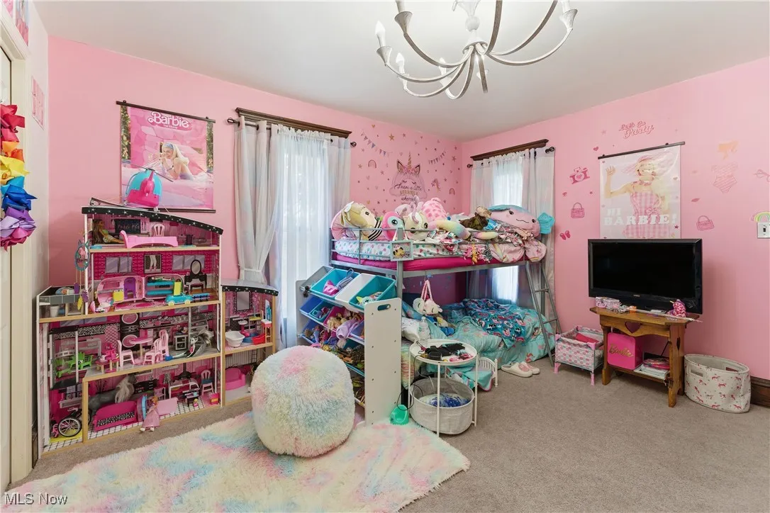Bedroom 2 featuring a chandelier