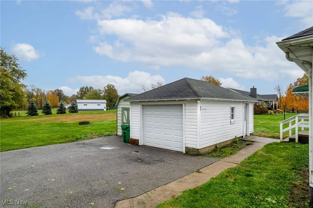 Detached garage with driveway