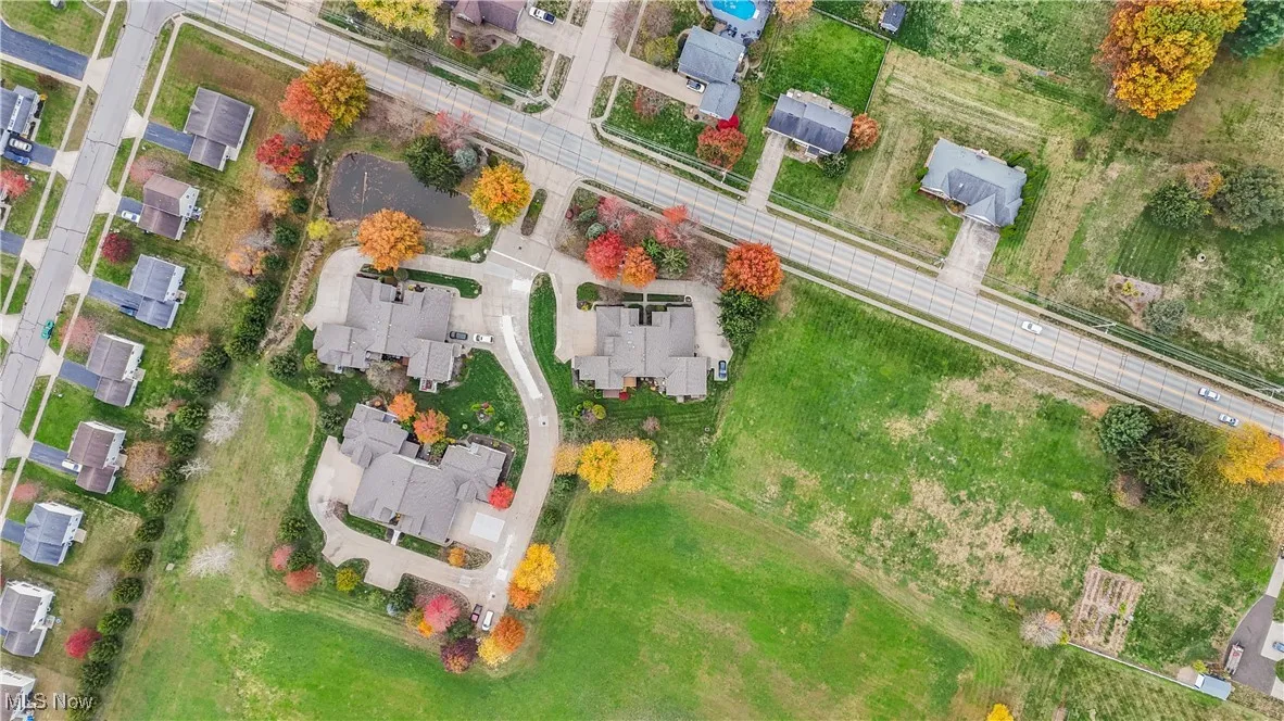 Aerial overview of property's location with nearby suburban area