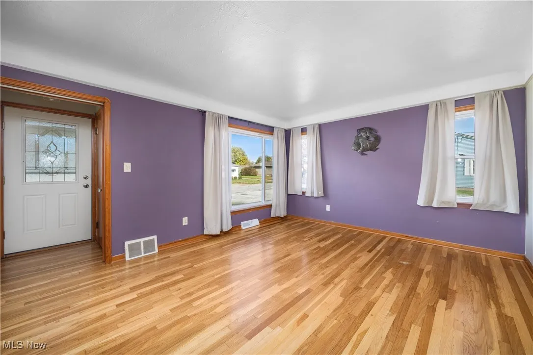Spare room with light wood-style floors