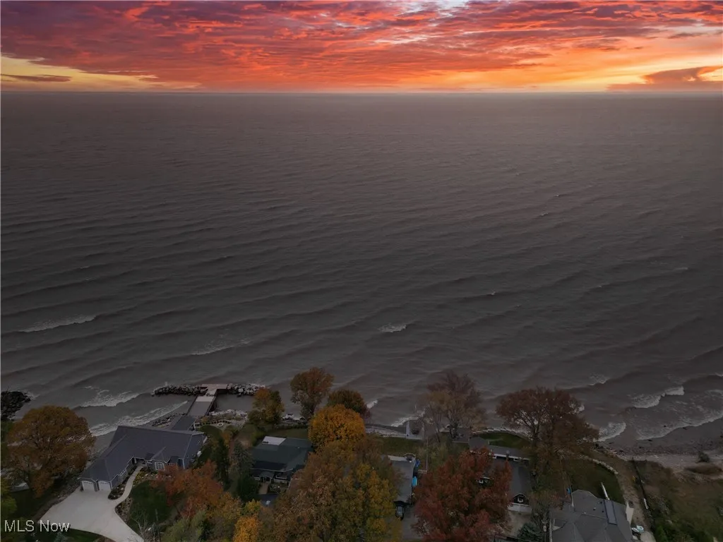 View of property location with a nearby body of water