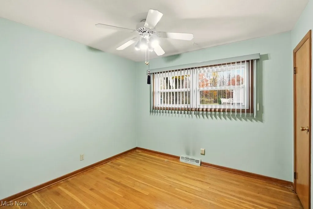 Bedroom 3 with hardwood flooring