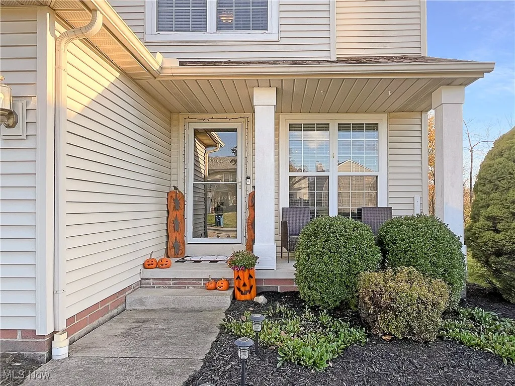 Entrance to property with covered porch